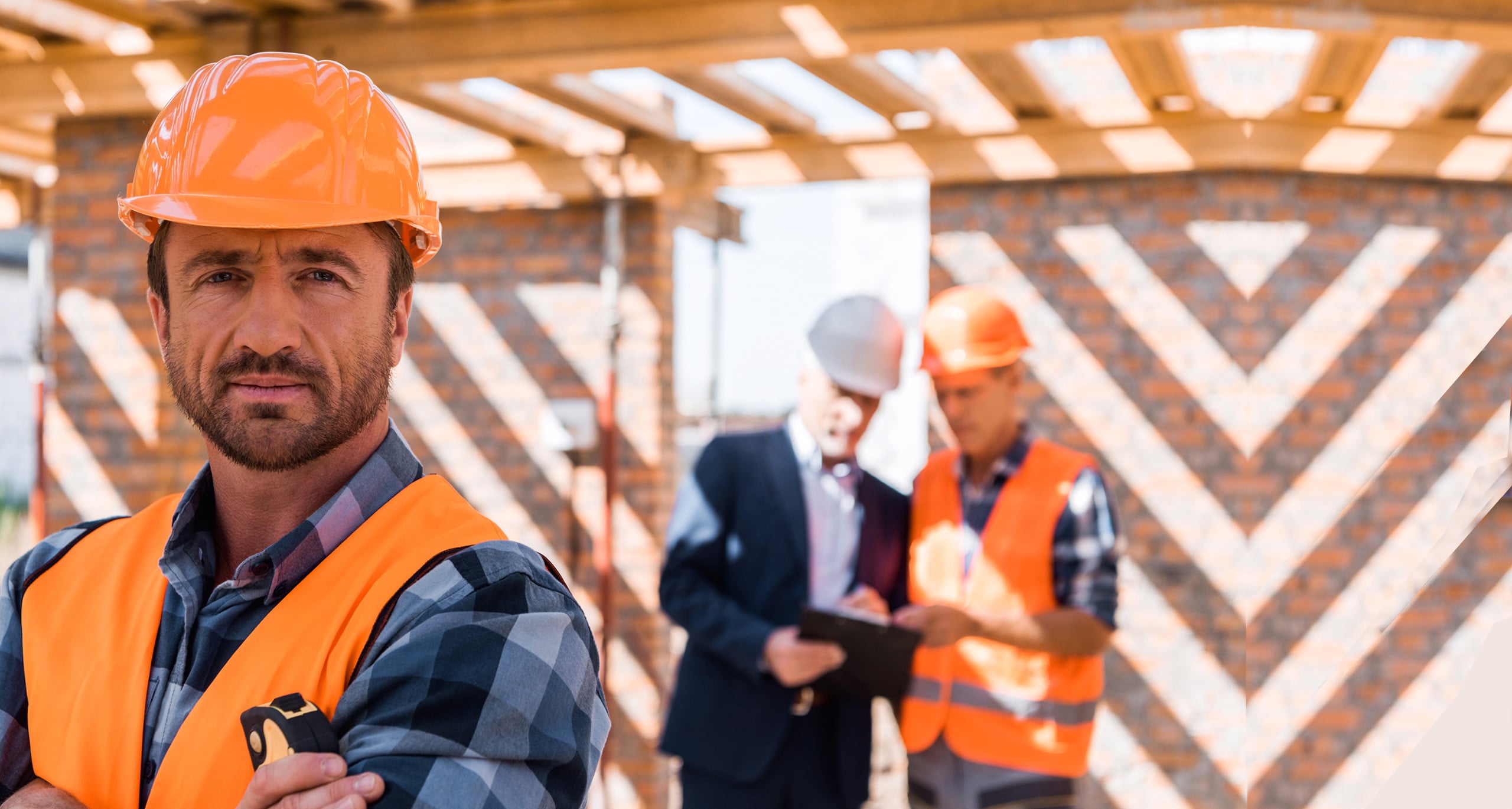 Residential contractor in hard hat on a California jobsite — The Contractors Resource Center.